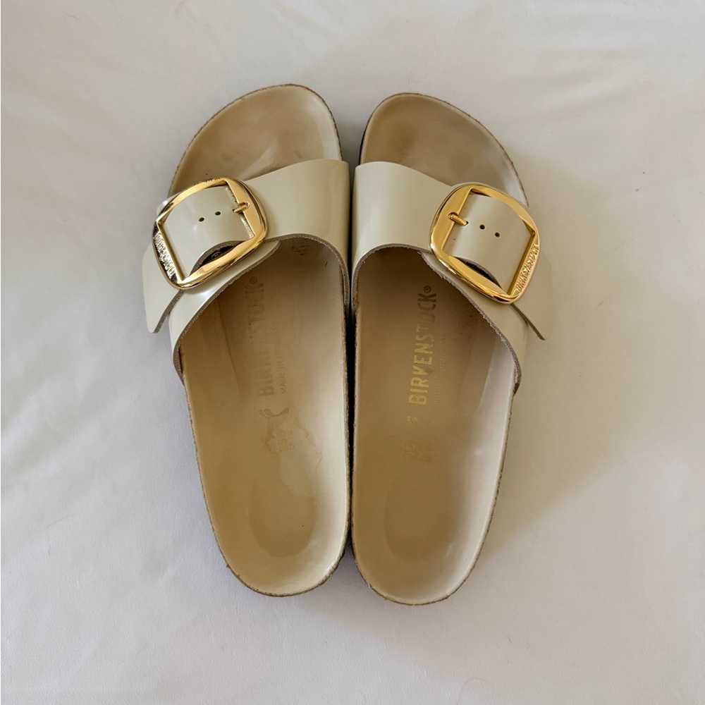 Birkenstock Single-Strap Cream Slide with Gold Buckle